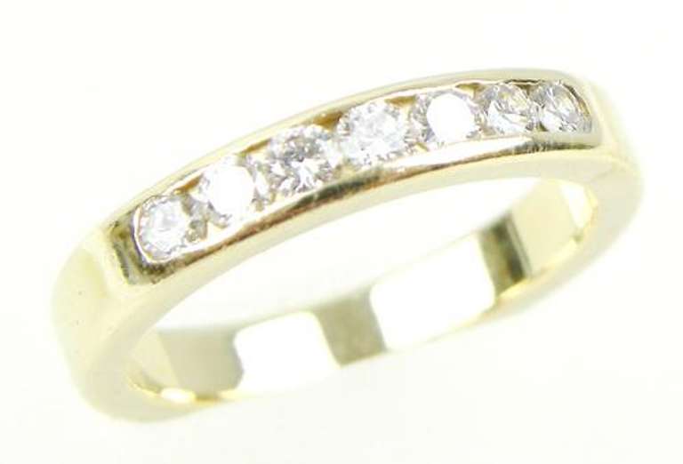 Versatile 14K Gold Band with 7 Diamonds, Size 6