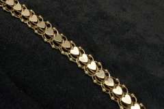 Heavy Tiered Heart Bracelet in Gold
