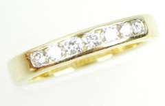 Versatile 14K Gold Band with 7 Diamonds, Size 6