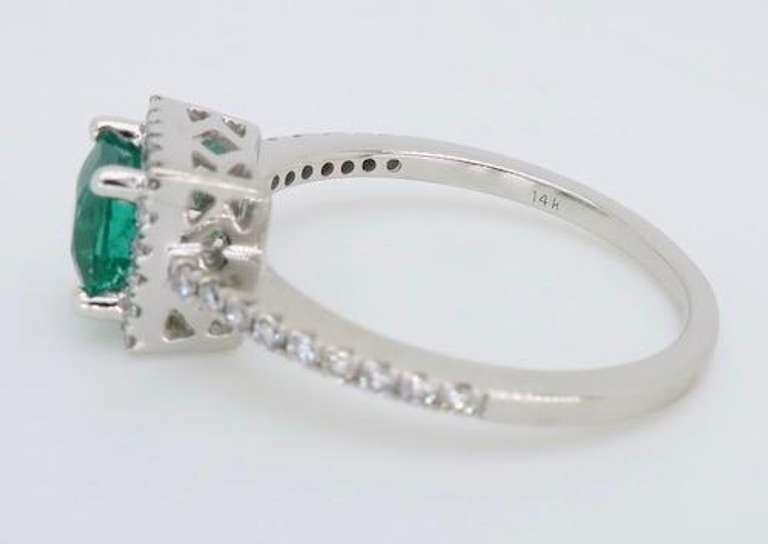Emerald and Diamond Halo Ring