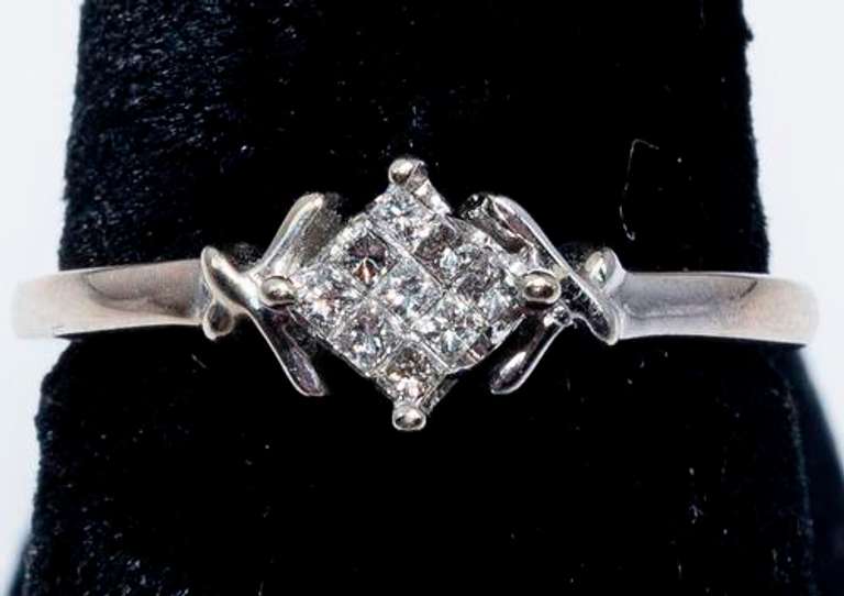 Invisibly Set Princess Cut Diamond Ring in Gold