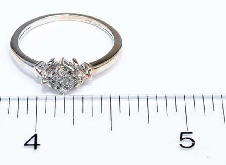 Invisibly Set Princess Cut Diamond Ring in Gold