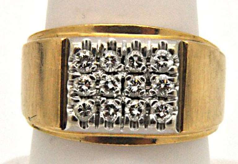 MEN'S 10K GOLD DIAMOND RING.