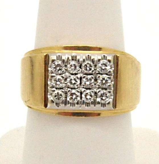 MEN'S 10K GOLD DIAMOND RING.