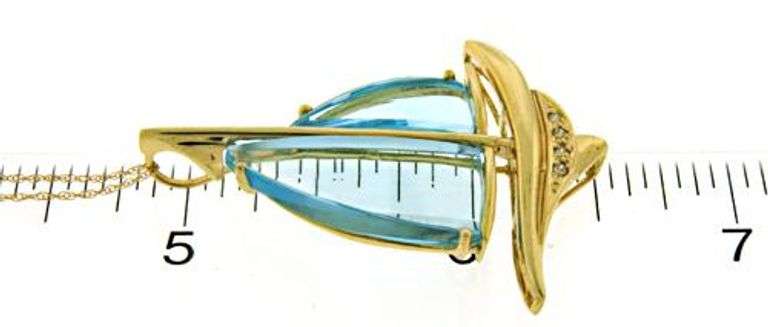 Favorite Fancy Cut Blue Topaz and Diamond Pendant