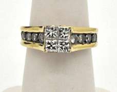 LADIES 14K YELLOW GOLD DIAMOND RING.