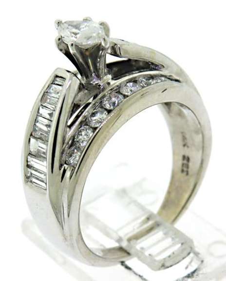 Nice Marquise Round Brilliant & Baguette Diamond Ring