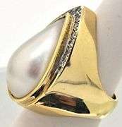 LADIES 18 KT YELLOW GOLD PEARL AND DIAMOND RING.