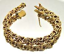 LADIES 18 KT YELLOW GOLD BRACELET.