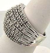 LADIES 14 KT WHITE GOLD DIAMOND RING.
