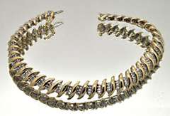 LADIES 14 KT YELLOW GOLD DIAMOND BRACELET.