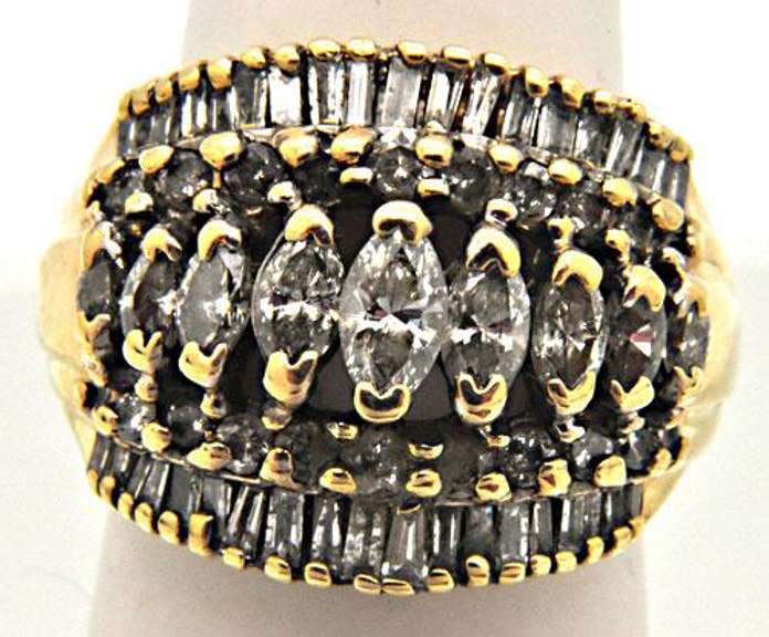 14 KT GOLD RING COVERED WITH DIAMONDS.