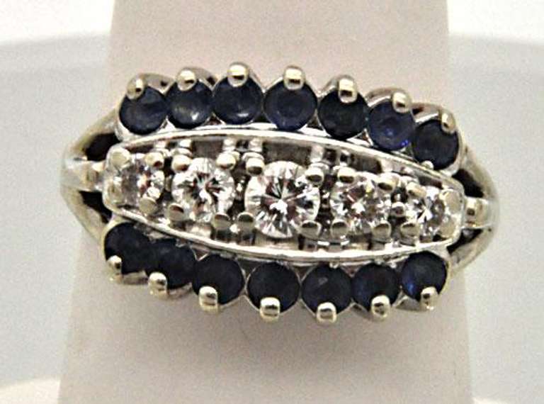 14 KT WHITE GOLD LADIES DIAMOND AND SAPPHIRE RING.