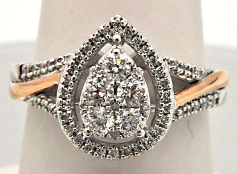14 KT WHITE GOLD LADIES DIAMOND RING.