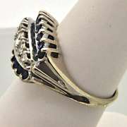 14 KT WHITE GOLD LADIES DIAMOND AND SAPPHIRE RING.