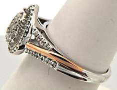 14 KT WHITE GOLD LADIES DIAMOND RING.