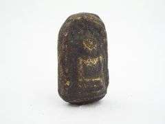 Antique Buddha Meditating under the Bodhi Tree