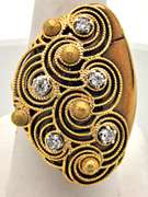 18 KT YELLOW GOLD FREE FORM DIAMOND RING.