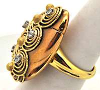18 KT YELLOW GOLD FREE FORM DIAMOND RING.