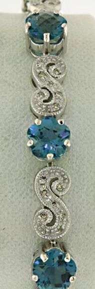 Stunning 14kt WG Blue Topaz and Diamond Bracelet