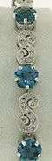 Stunning 14kt WG Blue Topaz and Diamond Bracelet