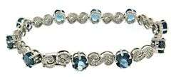 Stunning 14kt WG Blue Topaz and Diamond Bracelet