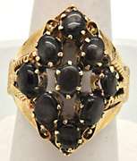 LADIES 18 KT YELLOW GOLD STAR SAPPHIRE RING.