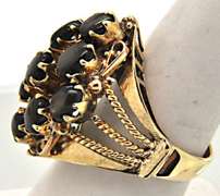 LADIES 18 KT YELLOW GOLD STAR SAPPHIRE RING.