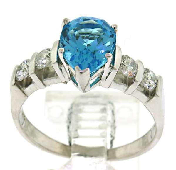 Lovely White Gold Blue Topaz and Diamond Ring