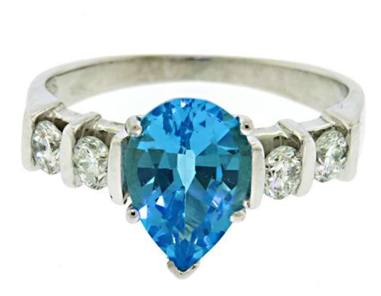 Lovely White Gold Blue Topaz and Diamond Ring
