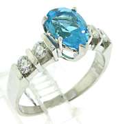 Lovely White Gold Blue Topaz and Diamond Ring