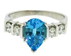 Lovely White Gold Blue Topaz and Diamond Ring