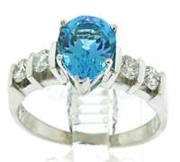 Lovely White Gold Blue Topaz and Diamond Ring