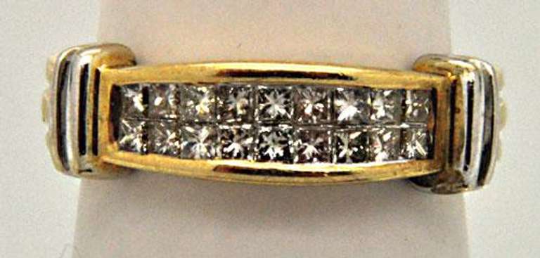 LADIES 14 KT YELLOW AND WHITE GOLD DIAMOND BAND.
