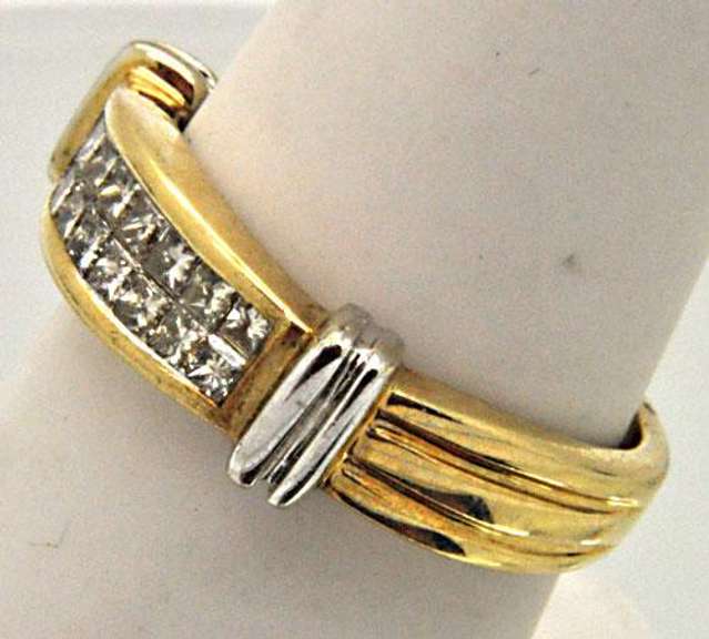 LADIES 14 KT YELLOW AND WHITE GOLD DIAMOND BAND.