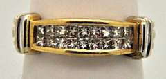 LADIES 14 KT YELLOW AND WHITE GOLD DIAMOND BAND.