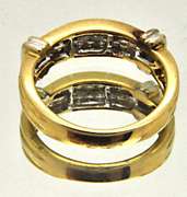 LADIES 14 KT YELLOW AND WHITE GOLD DIAMOND BAND.