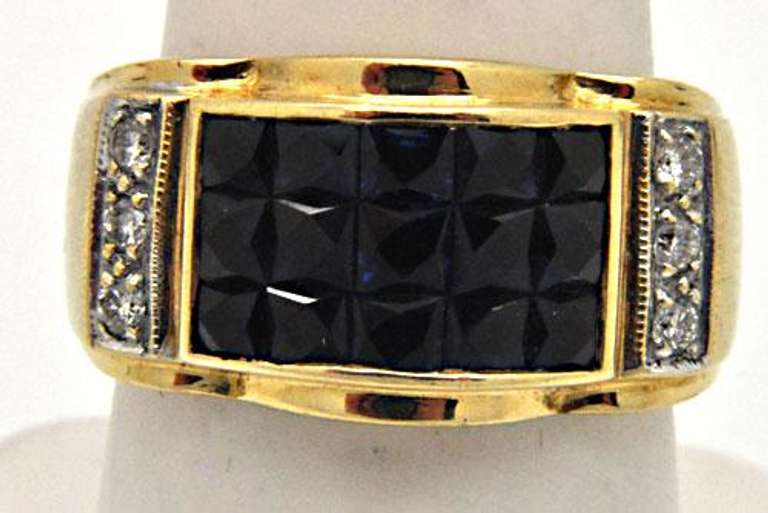 LADIES 18 KT YELLOW GOLD SAPPHIRE AND DIAMOND RING.