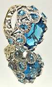 18 KT RING WITH A 25.00 CT BLUE TOPAZ & DIAMONDS