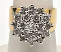 LADIES 14 KT GOLD DIAMOND CLUSTER RING.