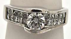 LADIES 14 KT WHITE GOLD DIAMOND ENGAGEMENR RING.