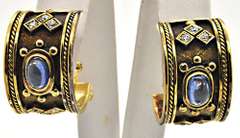 LADIES 18 KT YELLOW GOLD BLUE CABOCHON SAPPHIRE SET.