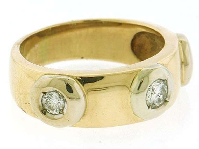 Three Dazzling Bezel Set Round Cut Diamonds