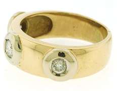 Three Dazzling Bezel Set Round Cut Diamonds