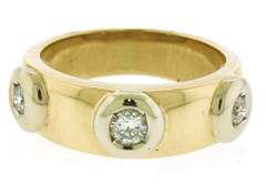 Three Dazzling Bezel Set Round Cut Diamonds