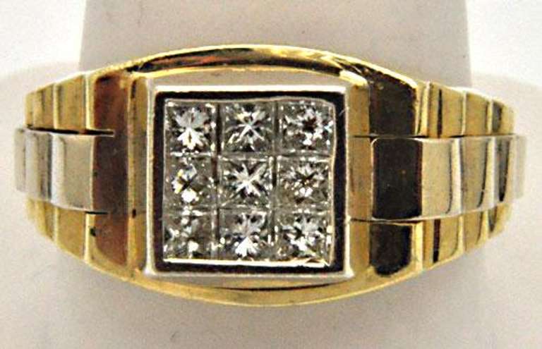 MEN'S 14 KT YELLOW GOLD DIAMOND RING.