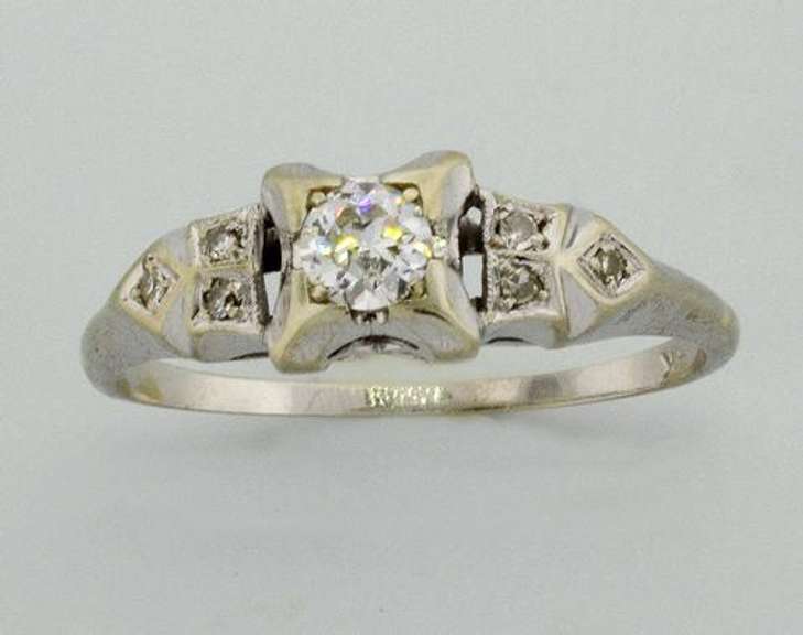 White Gold Filligree Ring with .25 CTW Diamonds