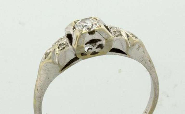 White Gold Filligree Ring with .25 CTW Diamonds