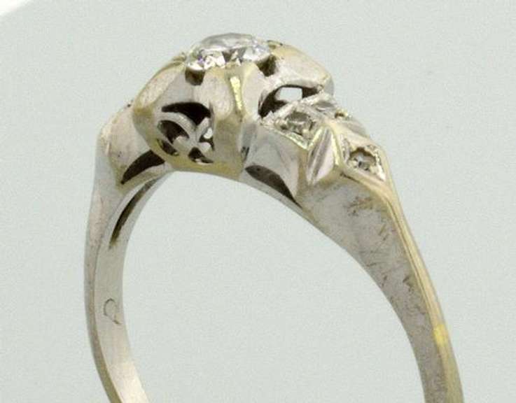 White Gold Filligree Ring with .25 CTW Diamonds