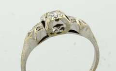 White Gold Filligree Ring with .25 CTW Diamonds